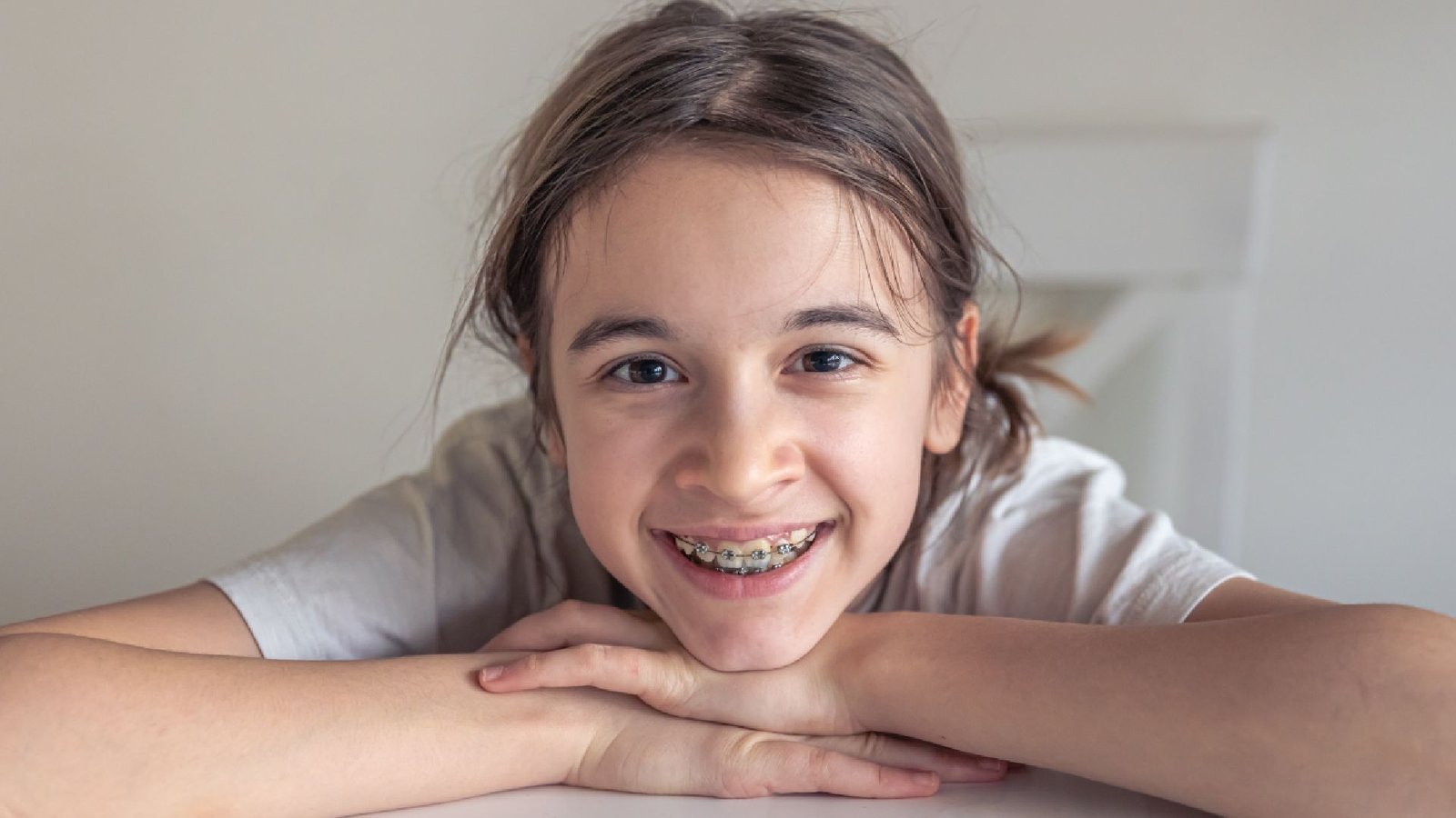 Smiling teenager with braces